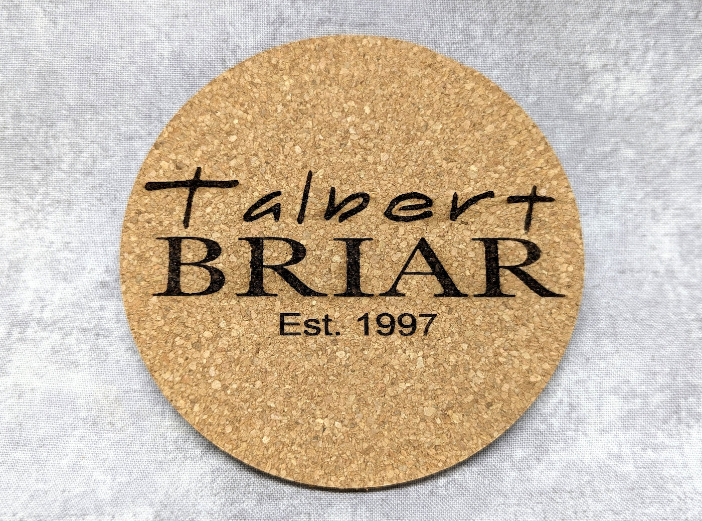 trever-talbert-coasters-dessous-de-verre-bruy-re-logo image 1